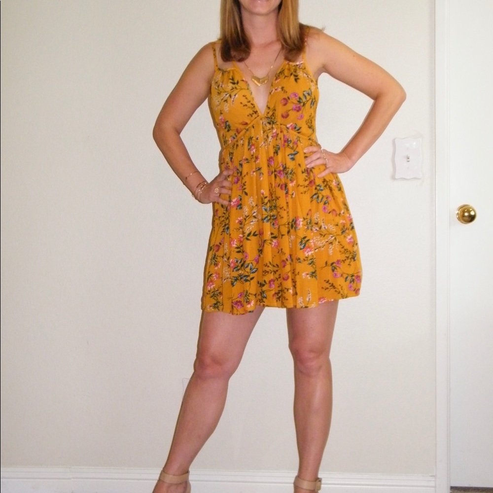 Lovoosh- Side Cutout Dress